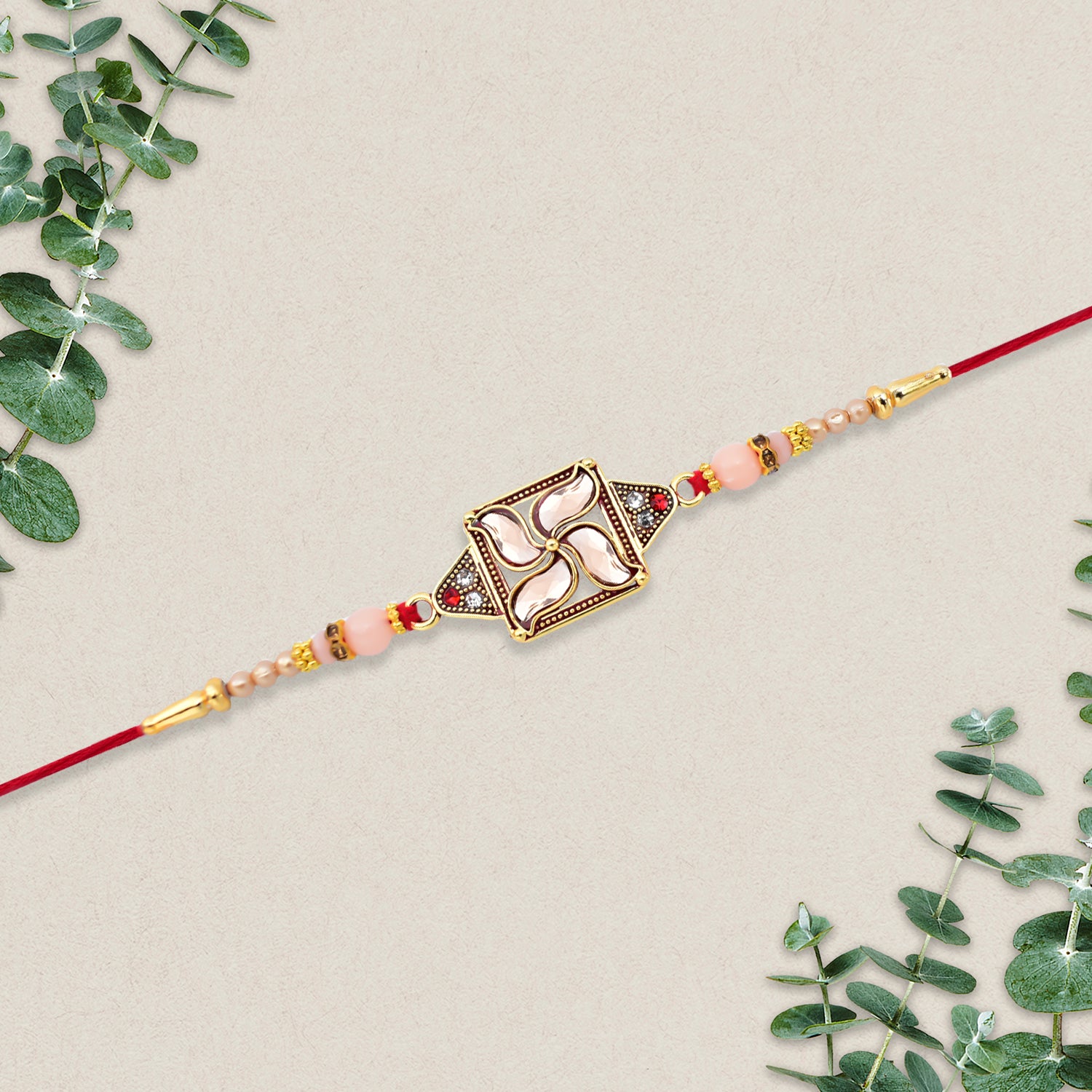 Designer Rakhi with Swastik-Inspired Kundan Dial and Decorative Beads